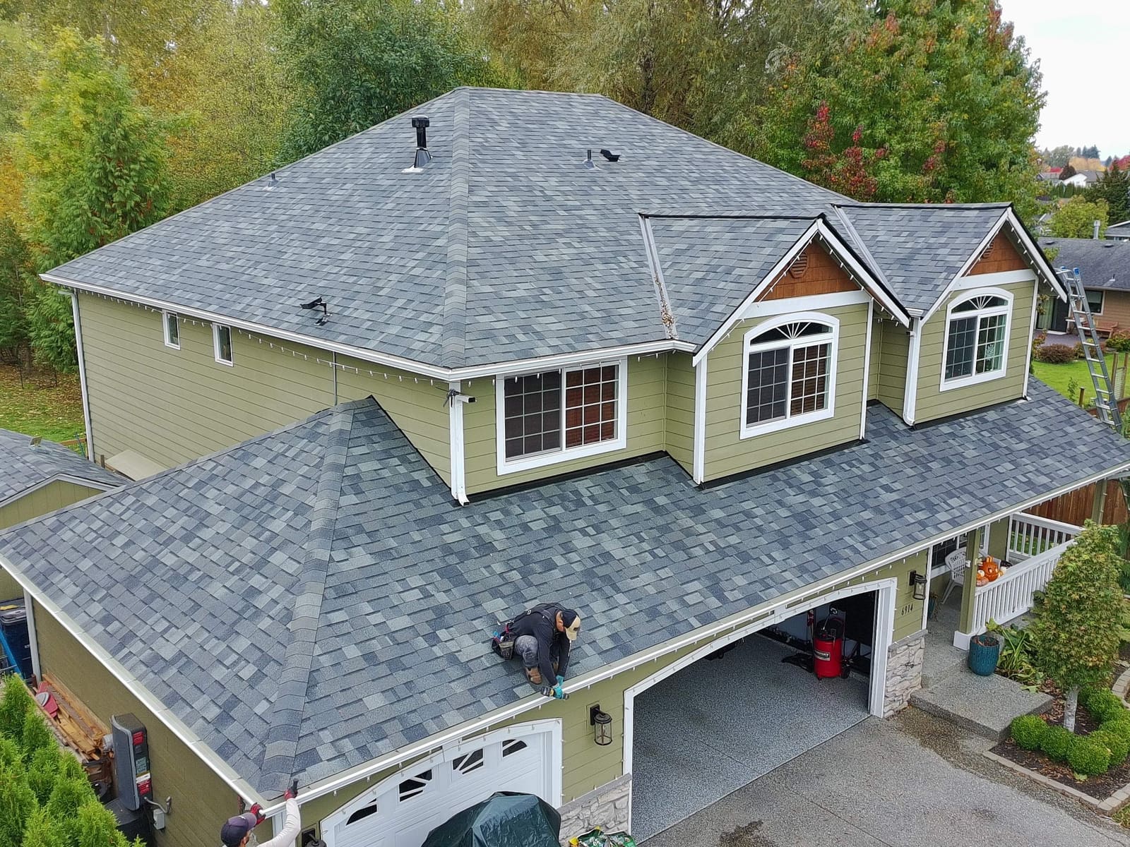 Completed shingle roof viewed from the front of the house