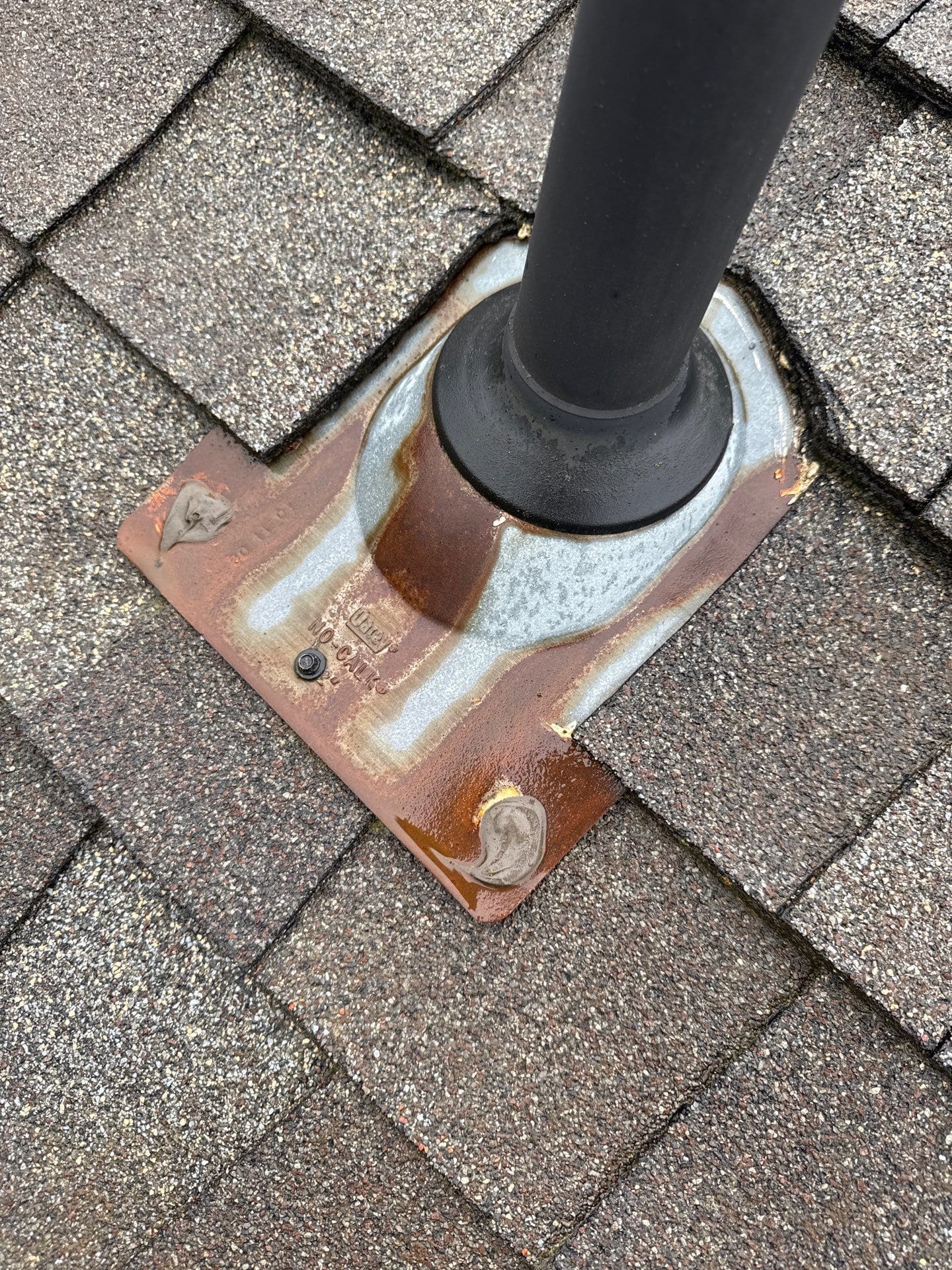 Close-up of a roof drainage detail that was improperly positioned